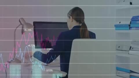 Businesswoman Analyzing Data on Computer with Overlayed Financial Charts