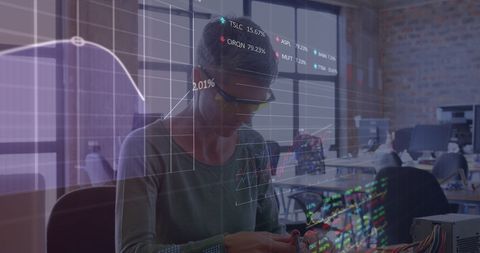 female engineer working with stock market data in modern office environment - Download Free Stock Images Pikwizard.com