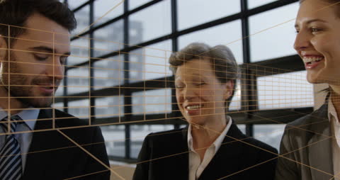 Caucasian Business Team with Digital Interface Overlay in Office