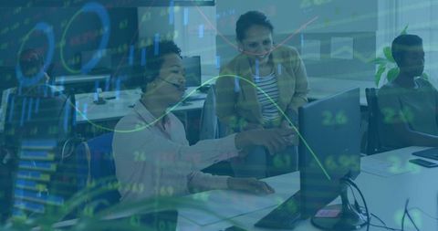 Women Collaborating in Modern Office with Digital Market Overlays