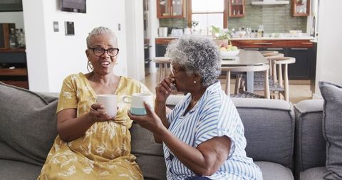 Senior African American Women Enjoying Friendly Conversation with Coffee - Download Free Stock Images Pikwizard.com