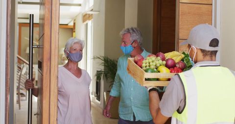 Grocery delivery to seniors during pandemic with safety precautions
