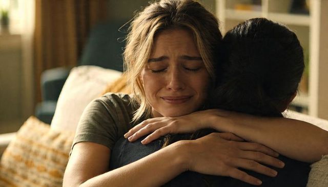 Two women hugging while one crying, showing comfort empathy support emotional healing