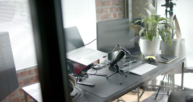 Modern Home Office with Music Production Equipment and Microphone - Download Free Stock Images Pikwizard.com