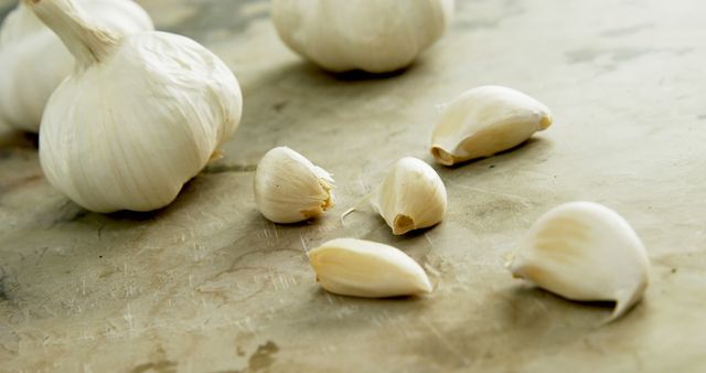 Fresh Garlic Bulbs and Cloves on Rustic Kitchen Counter - Download Free Stock Images Pikwizard.com