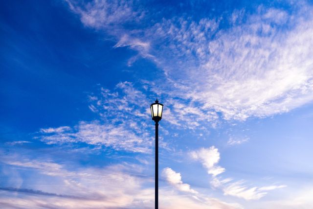 Vintage Street Lamp Against Vibrant Blue Sky with Clouds - Download Free Stock Photos Pikwizard.com
