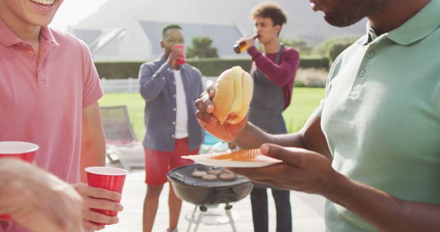 Friends Enjoying Outdoor Barbecue Gathering - Download Free Stock Images Pikwizard.com