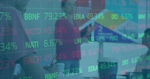 Modern Business Team Analyzing Financial Data on Stock Monitors