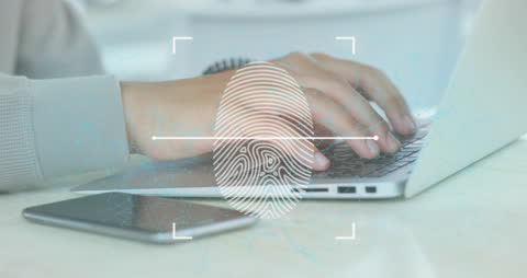 Hands Using Laptop with Futuristic Fingerprint Scan Interface
