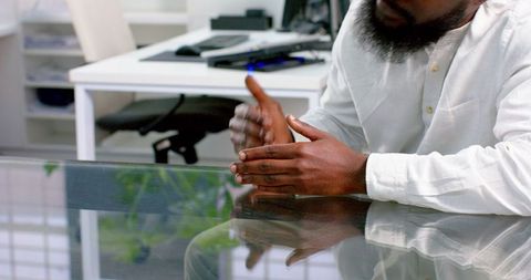 Businessman Discussing Project in Modern Workspace