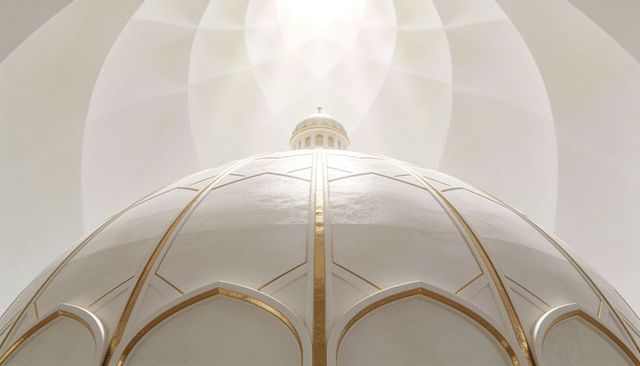 Ornate white gold dome rising under radiant oculus light with symmetrical vault