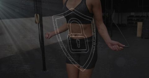 Jumping rope workout in dim gym, gripping handles, digital shield overlay