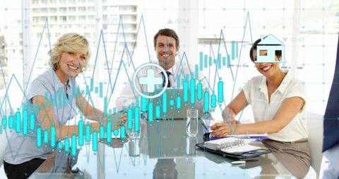 Business team collaborating on financial analytics with digital data overlays in modern office
