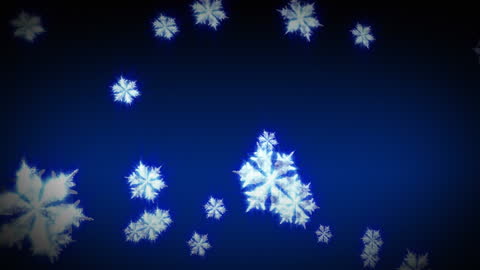 Glistening Snowflakes Falling on Deep Blue Background