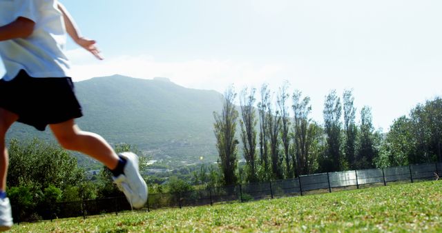 Child Running Outdoors in Mountain Valley on Sunny Day - Download Free Stock Images Pikwizard.com