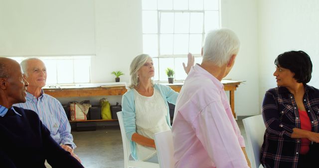 Senior Group Discussion in Bright Room - Download Free Stock Images Pikwizard.com