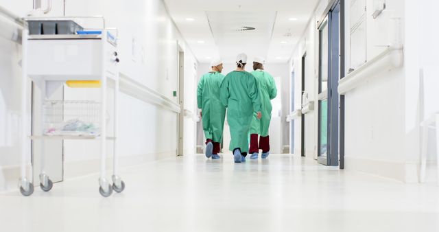 Healthcare Workers Walking Hospital Corridor - Download Free Stock Images Pikwizard.com