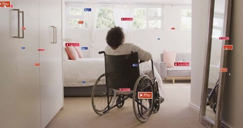 Elderly Woman in Wheelchair Relaxing by Bedroom Window