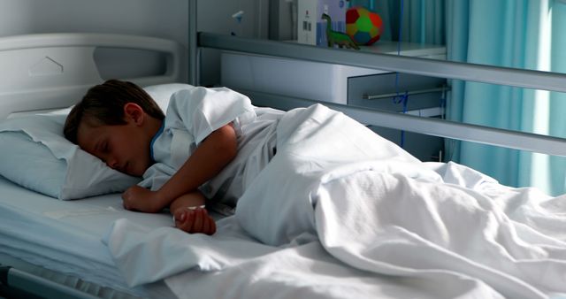 Child peacefully sleeping in hospital bed with soft bedding and curtain in medical ward. Suitable for use in medical literature, pediatric care articles, health care advertisements, and recovery process illustrations.