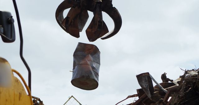 Industrial Claw Lifting Crushed Metal in Scrap Yard - Download Free Stock Images Pikwizard.com