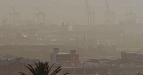 Industrial Cityscape Under Smog with Digital Overlay - Download Free Stock Images Pikwizard.com