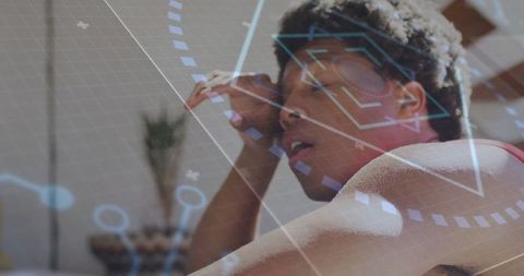 Man Integrating Fitness with Augmented Reality Gear in Gym