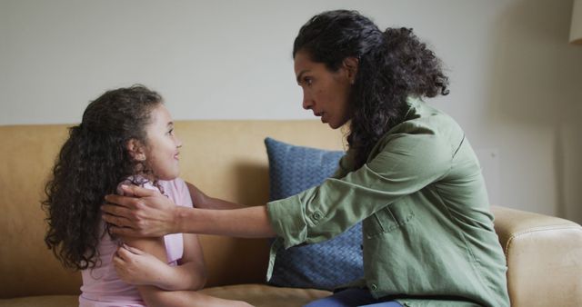 Mother Comforting Young Daughter on Couch at Home - Download Free Stock Images Pikwizard.com