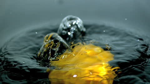 Yellow Bell Pepper Creating Splash in Slow Motion Close Up