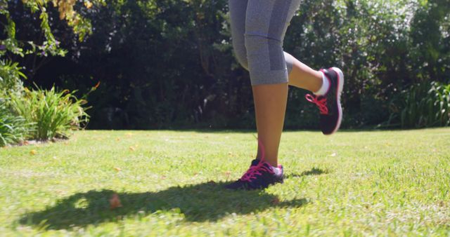 Woman Runner Wearing Leggings Running in Park - Download Free Stock Images Pikwizard.com