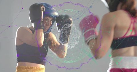Female Boxers Sparring with Futuristic Wireframe Holographic Overlay in Gym Training