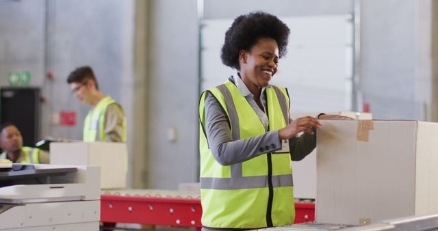 Warehouse Workers Packing Boxes with Smiling Employee - Download Free Stock Images Pikwizard.com