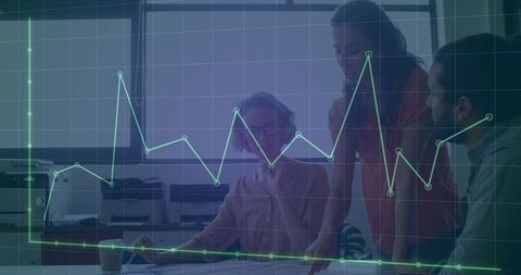 Business Team Analyzing Strategy with Graph Overlay