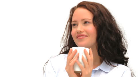 Dreamy Woman Enjoying Coffee in minimalist Setting