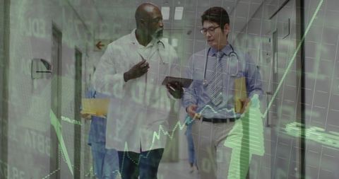 Medical Professionals Examining Data Trends at Hospital