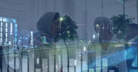 Businesswomen Collaborating Over Digital Finance Data