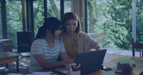 Asian Mother and Daughter Bonding Over Computer - Download Free Stock Images Pikwizard.com