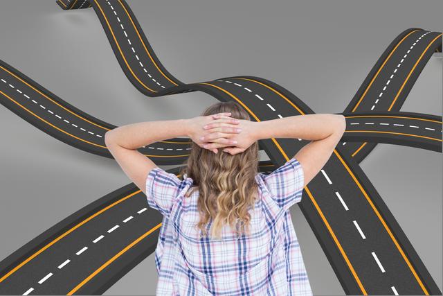 This image shows a woman staring at multiple intertwined roads with her hands behind her head, which conveys hesitation and confusion. It can be used for concepts related to decision-making, navigating life's paths, career choices, financial decisions, or portraying a sense of being overwhelmed.
