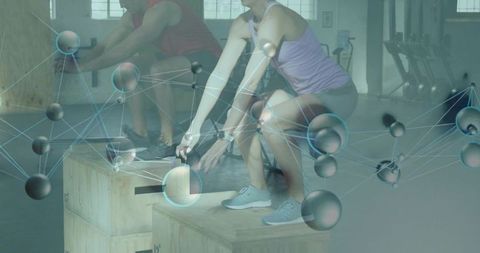 Athletes performing plyometric box squats with molecular overlay for fitness science