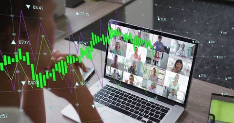 Businesswoman Conducting Virtual Meeting with Financial Data Overlay