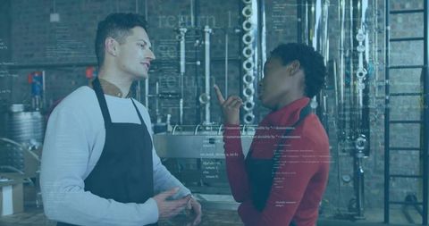 Distillery experts evaluating industrial equipment in efficient operation