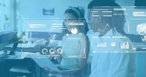 Team collaborating on holographic business dashboard with real-time analytics overlays
