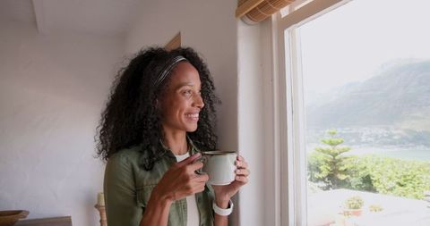 Serene Morning Coffee Cue with Woman by Coastal View
