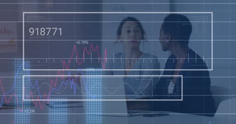 Diverse Businesswomen Discussing Digital Reports and Analytics