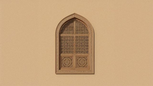 Ornate arched lattice window on stucco wall