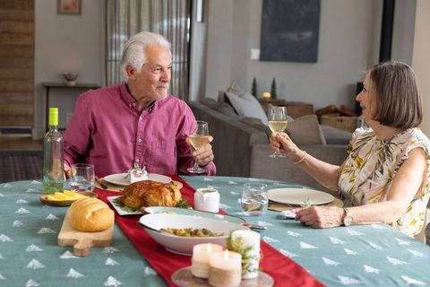 Senior Couple Enjoying Intimate Holiday Meal at Home