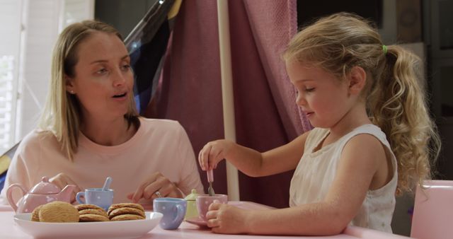 Mother and Daughter Enjoy Tea Time Together Indoors - Download Free Stock Images Pikwizard.com