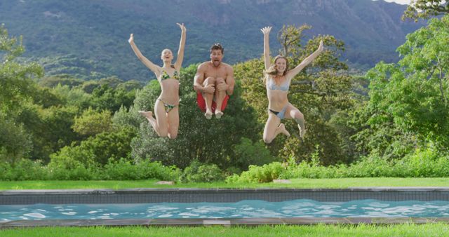 Friends Jumping into Pool on Summer Vacation Outdoors - Download Free Stock Images Pikwizard.com