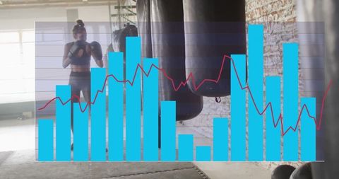 Fitness Enthusiast Training with Data Overlay in Boxing Gym