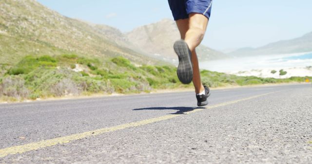 Close-up Runner's Legs on Mountain Road - Download Free Stock Images Pikwizard.com