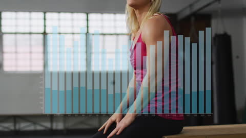 Female Athlete with Digital Data Graph Overlay in Gym Setting